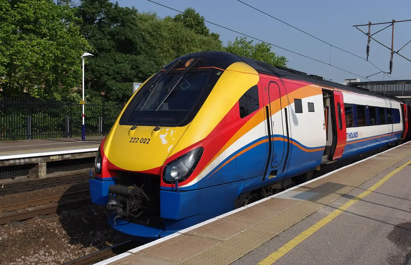 A passenger train at a platform at Bedford railway station